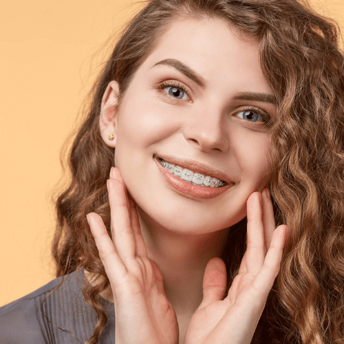 A woman with metal braces in Stockport, manchester at heaton mersey orthodontic centre