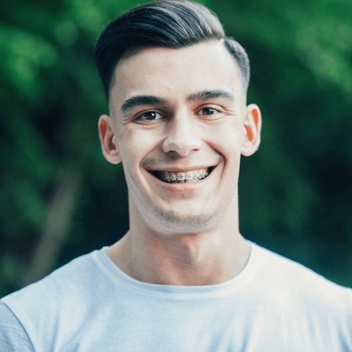 a young man with damon braces in manchester