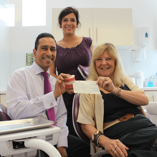 Dr Bilal Bhatti with one of the patients at heaton mersey orthodontic centre