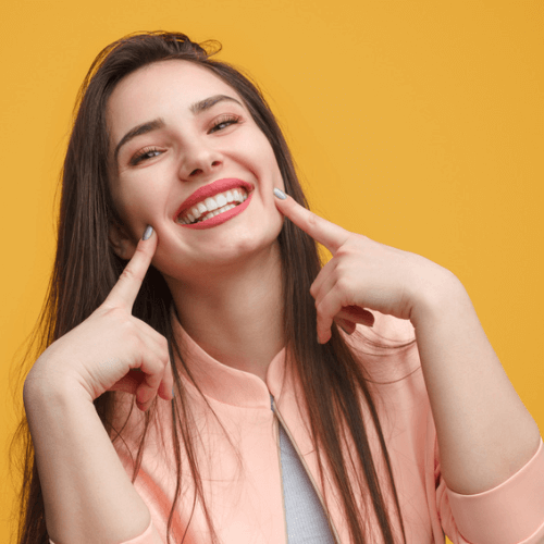 woman with a perfect smile after braces