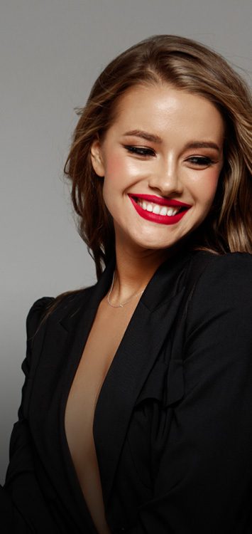 woman with straight teeth smiling in Manchester