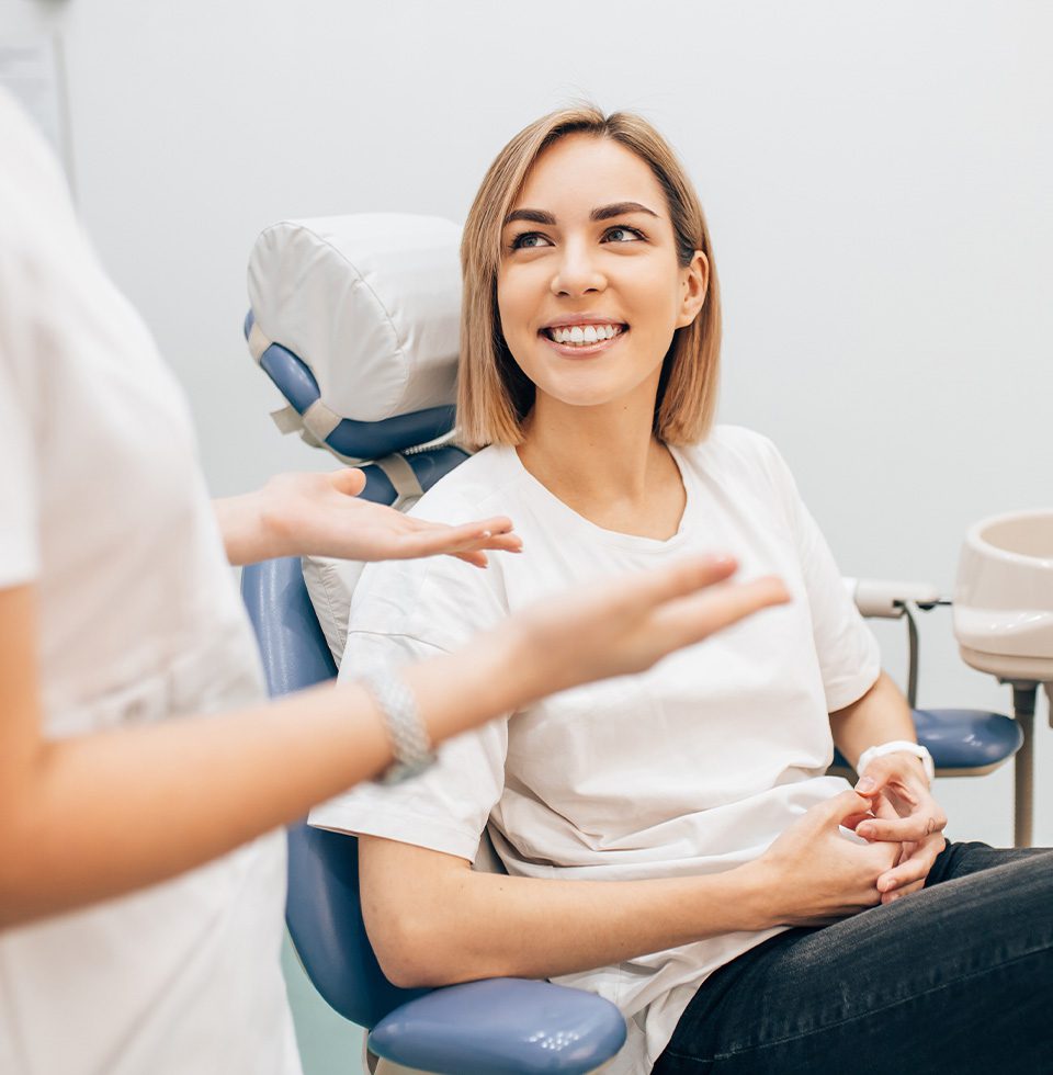 A female patient smiling during Orthodontic treatment at Heaton Mersey in Manchester
