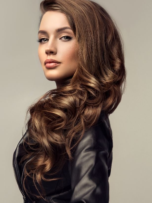 Woman looking at the camera after undergoing Facial Rejuvenation treatments At Heaton Mersey Orthodontics