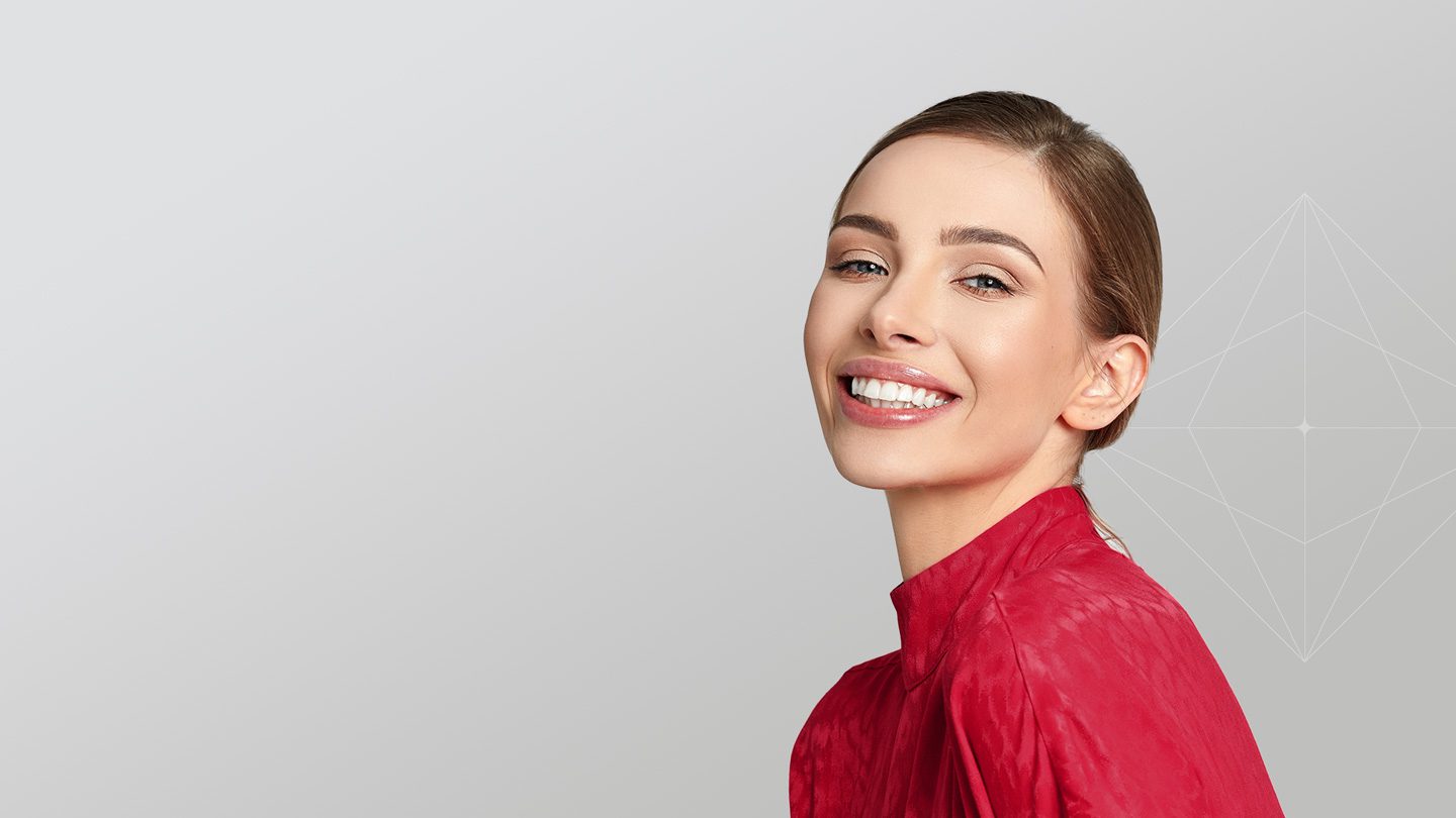 woman smiling after Orthodontic treatment at Heaton Mersey in Manchester