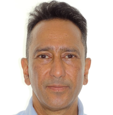 Dr Bilal Bhatti, manchester orthodontist, facing towards the camera.